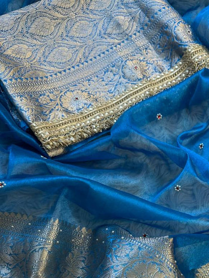 Teal Blue Banarasi Tissue Silk Saree with Hand Embroidered Moti Work & Heavy Lace Border