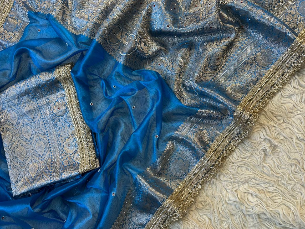 Teal Blue Banarasi Tissue Silk Saree with Hand Embroidered Moti Work & Heavy Lace Border